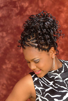 Model Looking down to the Right: Updo With Beautiful Curls Black Hairstyles for Little Girls