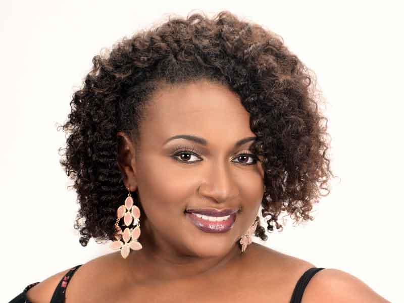Natural Hairstyle with Tight Curls from Kenya Young