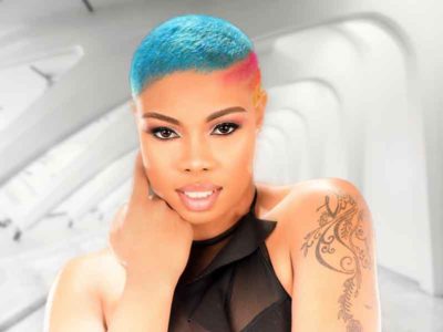 Shaved Hairstyle with Designs and Rainbow Hair Color Ideas for Black Women