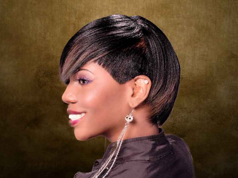 Kimberly Caldwell's short asymmetrical haircut with one side longer than  the other