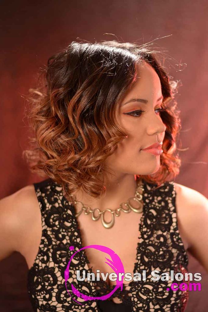 Left View: Medium Length Curly Bob Hairstyle⁬ with Highlights