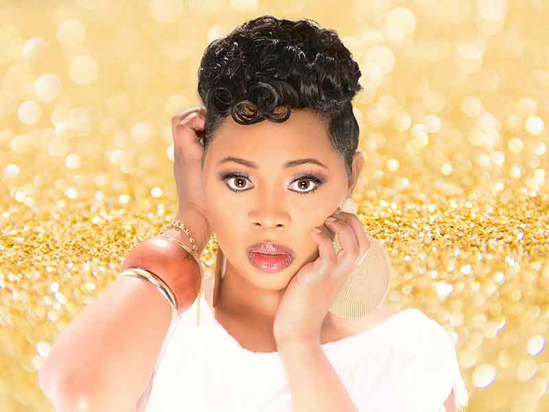 Short Hairstyle for Black Women with Tapered Sides from Ashlee Gradic
