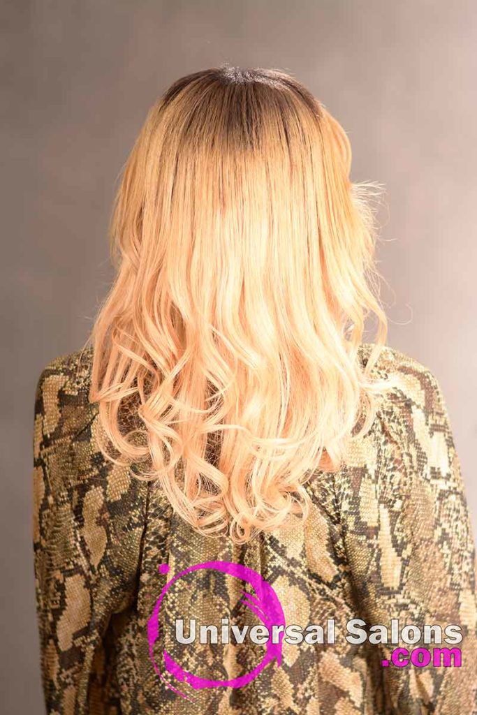 The Back View of a Long Curly Sew-In Hairstyle