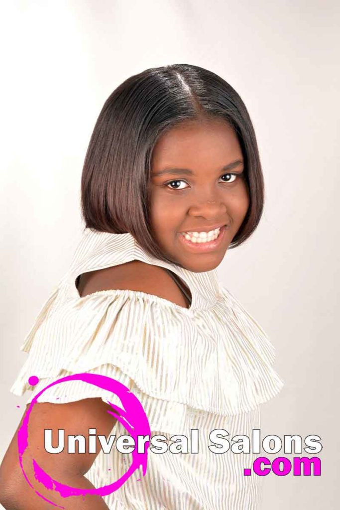 Little Girl Wearing Silk Press Natural Hairstyle