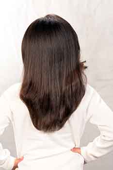 Back View: Long Silk Press Hairstyle with Side Bang