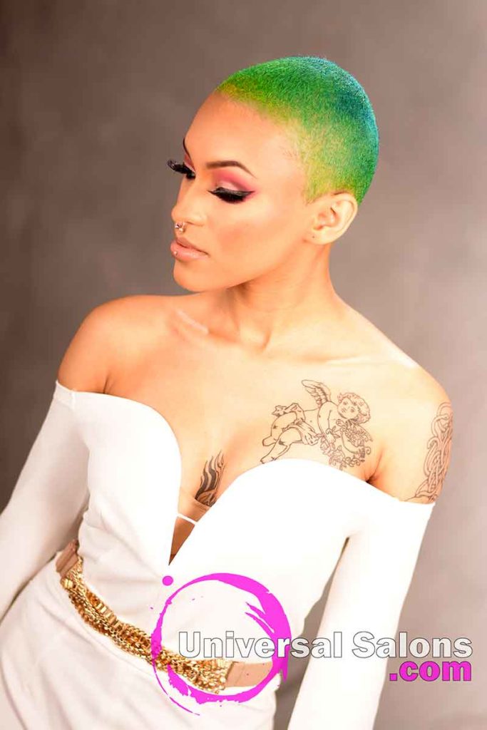 Model Looking Left Wearing Green, Yellow, and Blue Rainbow Hair Color