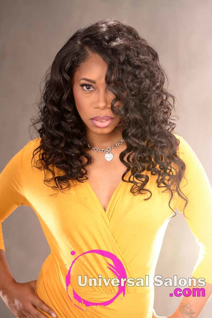 Long Curly Sew-In Hairstyle for Black Women