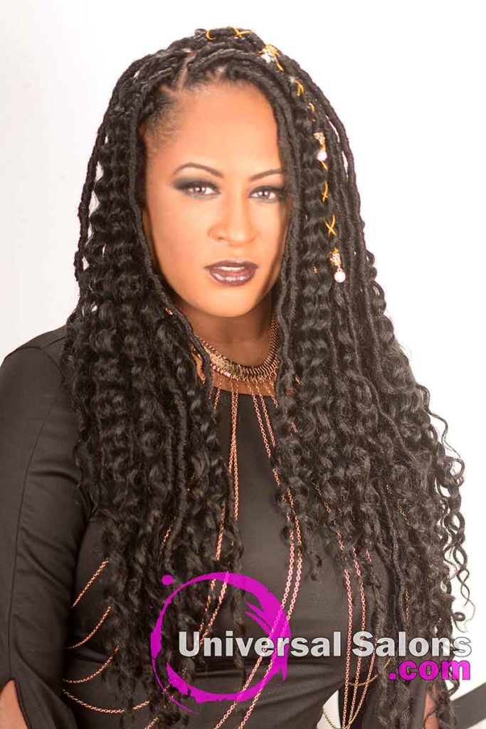 Model With Triangle Partings and Goddess Locs