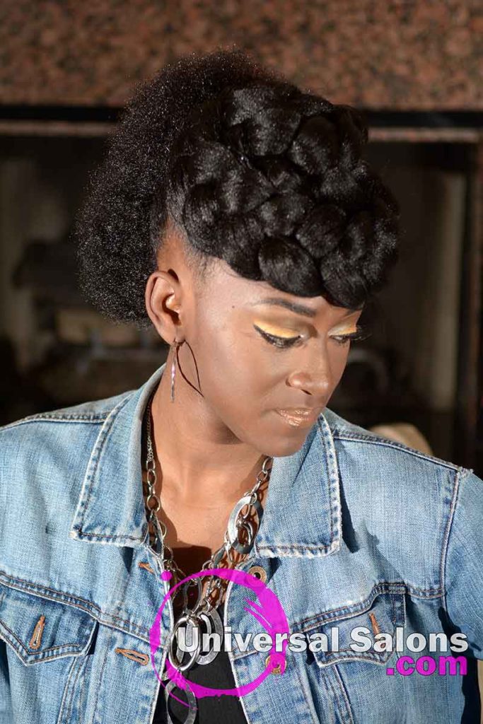 Model Looking Down With Goddess Braid & Afro Mohawk Hairstyle
