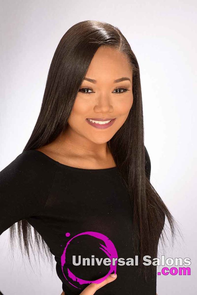 Model Smiling With silk Press Natural Hairstyle